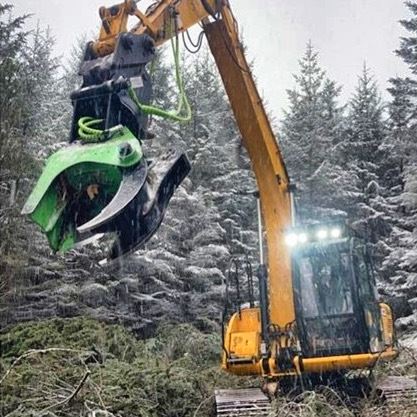 JCB with shearing kit mounted on the arm